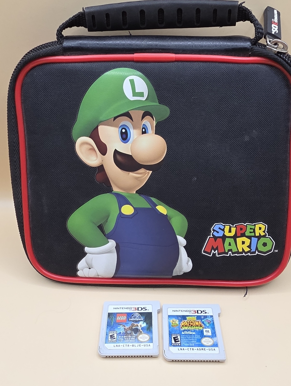 Super Mario Nintendo 3DS Case & LEGO Jurassic World, Moshi Monsters: Katsum